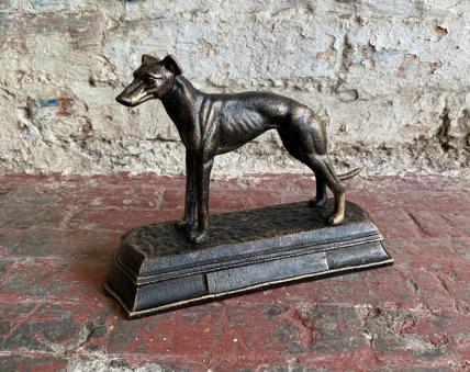 small greyhound figure